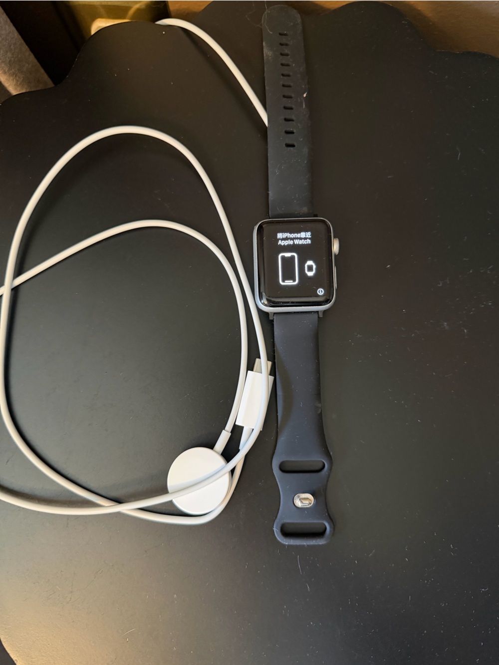 Apple Black Smartwatch 42 mm Series 3 with White Charging Cable